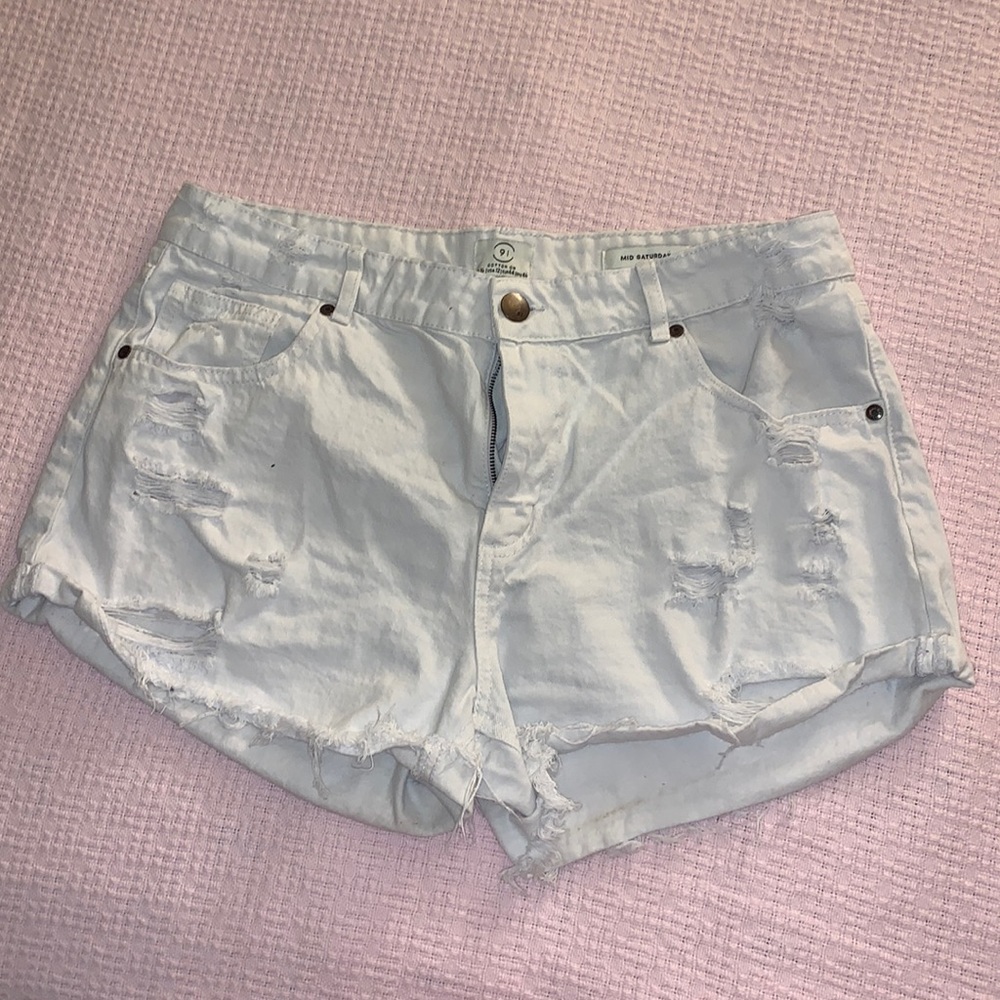 White denim ripped shorts
